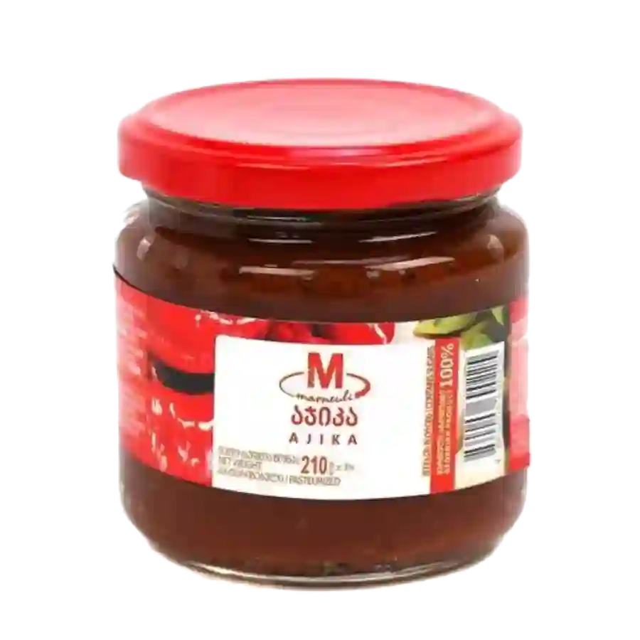 Marneuli Rote Adjika – 210 g Eine scharfe, dickflüssige Paste aus roten Paprika und Gewürzen, die in Georgien praktisch immer griffbereit ist. Die Marneuli-Adjika ist leuchtend rot, deutlich gewürzt und besitzt jene angenehm säuerliche Tiefe, an der man sofort erkennt, dass es sich um die „echte" Adjika handelt. Marneuli Rote Adjika – 210 g